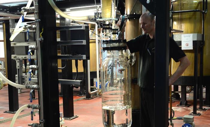 A distiller at work